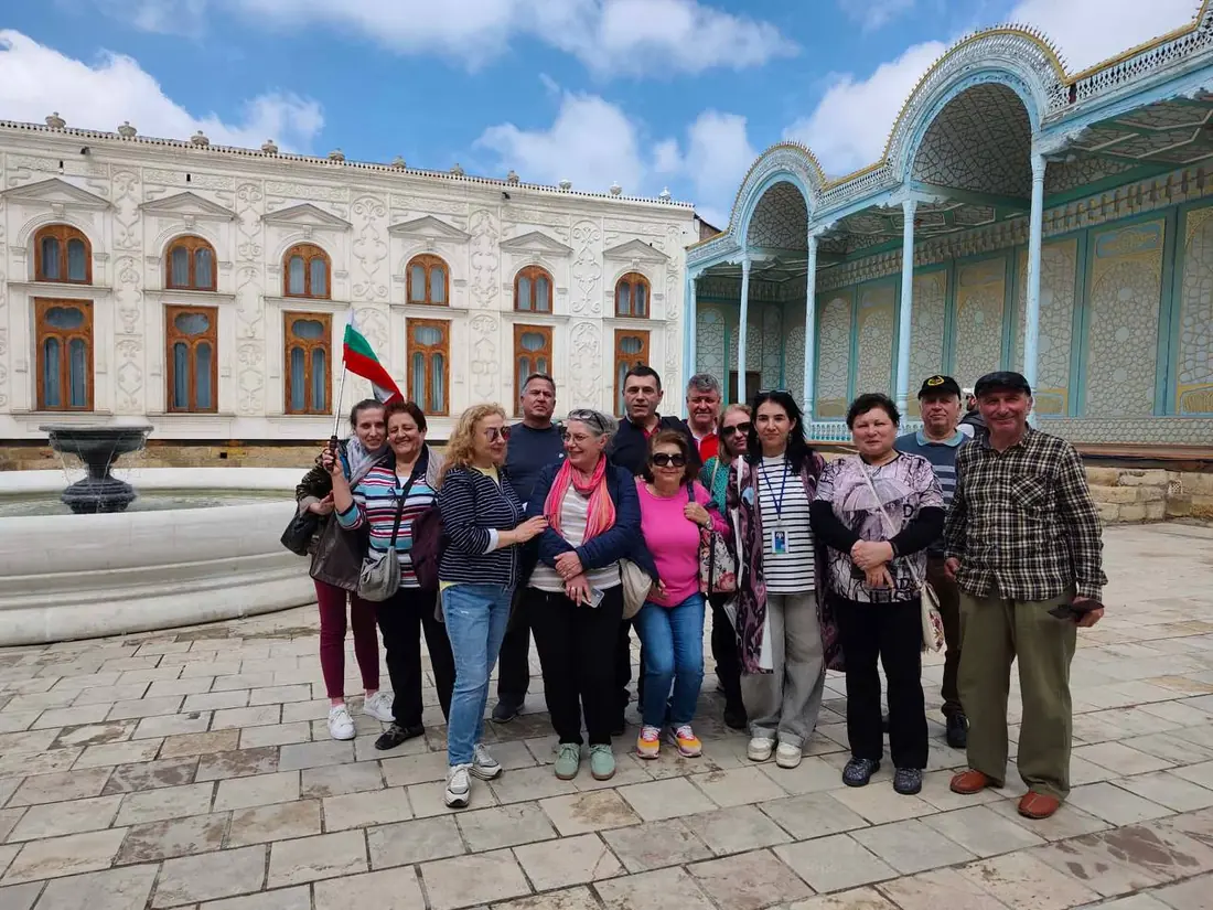Group tour photo at Sitorai Mokhi-Khosa summer palace with fountain, Bukhara